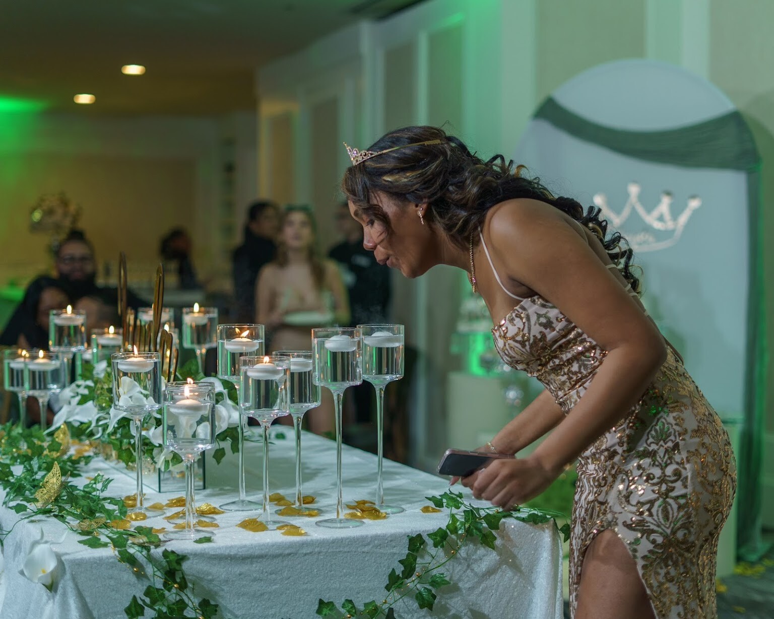 Decorations, candle ceremony, Queen Tiffany throne, table setup, centerpieces, gold pedals for Jadya's Sweet 16 in Staten Island, New York at the Grand Plaza done by PMT Party Services Group