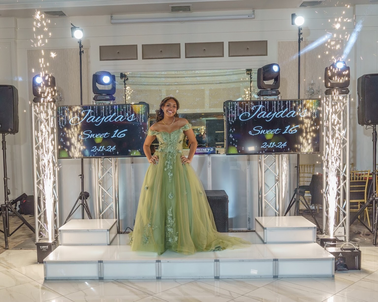 Decorations, candle ceremony, Queen Tiffany throne, table setup, centerpieces, gold pedals for Jadya's Sweet 16 in Staten Island, New York at the Grand Plaza done by PMT Party Services Group, courtesy of Island Entertainment